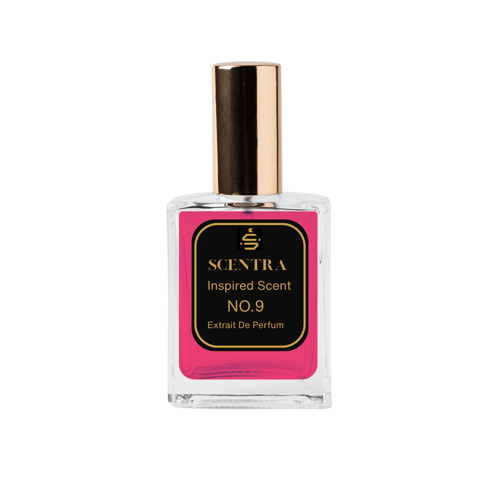 Scentra No.9 Amber Floral Extrait de Parfum glass bottle with gold cap filled with vibrant hot pink fragrance oil.